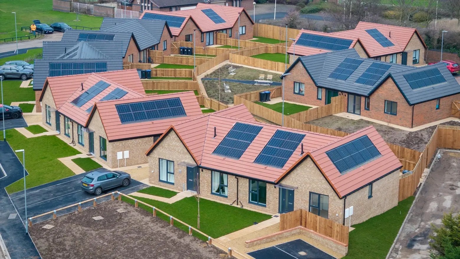 Aerial view of Esh Construction development, Kedward Avenue, showing newly built bungalows with solar panelled roofs