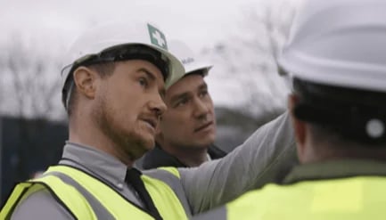 JG Hale site manager talking to other workers on site