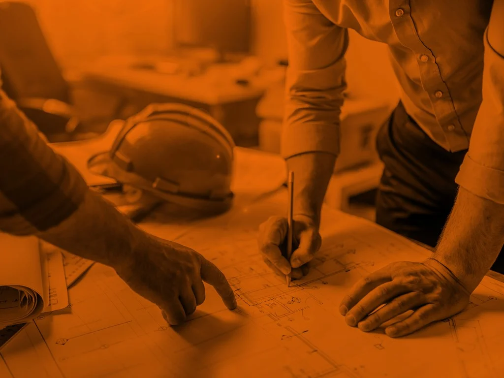 Architects looking at plans and drawings